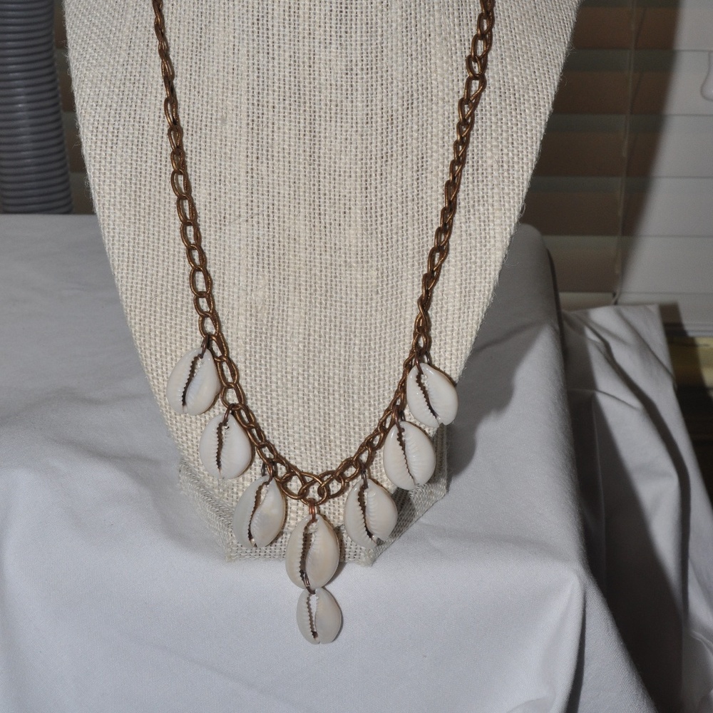 Cowry shell/cord necklace